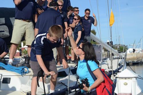Sonia Riley moves in with a congratulatory kiss for her son Jo after he completed his first Marion Bermuda Race on Shindig.<br />
 © Talbot Wilson